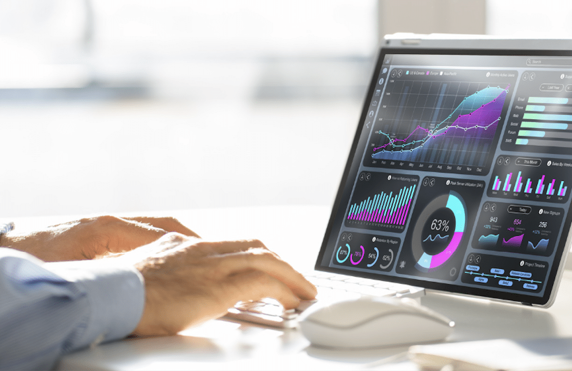 procurement spend analysis - image of hands typing on a PC keyboard - SpendQube